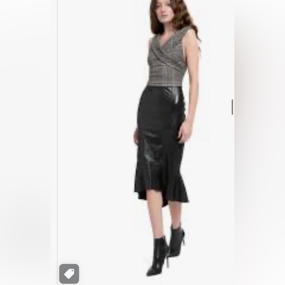 Athena Marie Dresses & Skirts - NWT Athena Marie Faux Black Leather Skirt. Size Medium/Large.